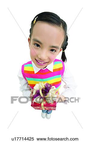 Stock Photography - Casual Clothing, Asian Ethnicity, Button Down Shirt, Braids, Black Hair, Cheerful, 12-13 Years. Fotosearch