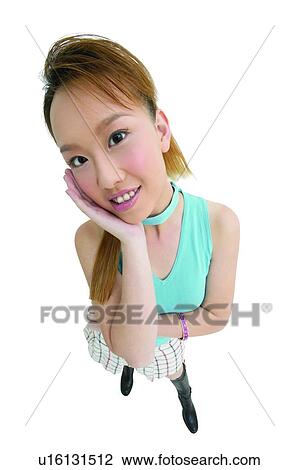 Stock Image - Cheerful, Asian Ethnicity, Casual Clothing, Brown Hair, Beautiful, Clipping Path, 18-19 Years. Fotosearch