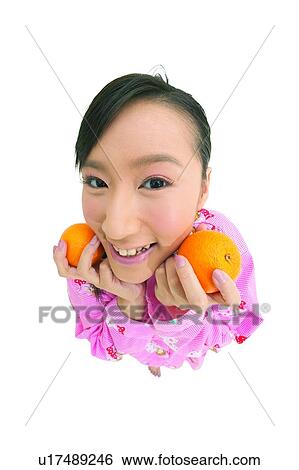 Stock Photograph - Clipping Path, Asian Ethnicity, Cheerful, Casual Clothing, Black Hair, Close-Up, 18-19 Years. Fotosearch