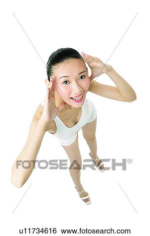 Stock Photograph - Clipping Path, Beautiful, Cheerful, Casual Clothing, Black Hair, Asian Ethnicity. Fotosearch