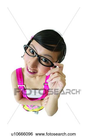 Cut Out, Standing, One Young Woman Only, Cheerful, Indoor, Anticipation View Large Photo Image Stock Photograph - Cut Out, Standing, One Young Woman Only, Cheerful, Indoor, Anticipation. Fotosearch