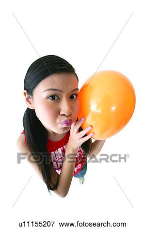 Stock Photo - Holding, White Background, Puckering, Focus Faces, Clipping Path, Balloon, Nostalgia. Fotosearch