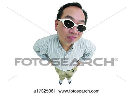 Stock Image - One Young Man Only, Attitude, Posing, Lifestyles, Black Hair, Standing. Fotosearch