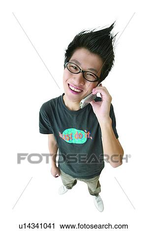 Stock Image - Portrait, One Person, Standing, One Teenage Boy Only, Talking, Adolescence. Fotosearch