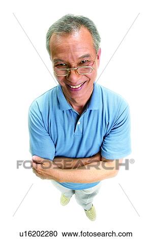 Senior Adult, Polo Shirt, Close-Up, Looking Up, One Senior Man Only, Asian Ethnicity View Large Photo Image Stock Image - Senior Adult, Polo Shirt, Close-Up, Looking Up, One Senior Man Only, Asian Ethnicity. Fotosearch