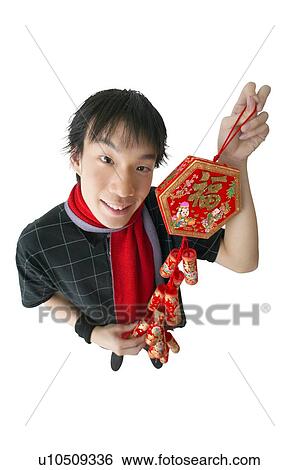 Stock Photograph - Black Hair, Close-Up, Casual Clothing, Asian Ethnicity. Fotosearch