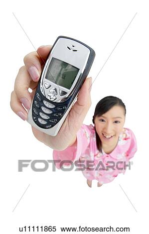 Stock Photography - Black Hair, Close-Up, Cheerful, Casual Clothing, Asian Ethnicity. Fotosearch