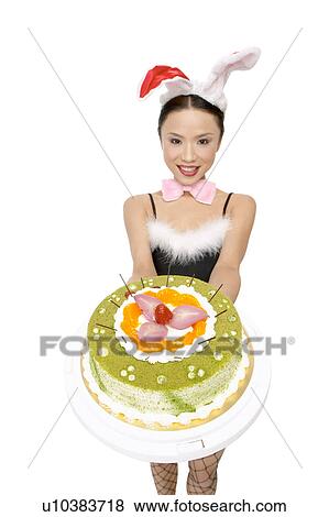 Stock Photo - Bow Tie, White Background, Asian Ethnicity, Posing, Happiness. Fotosearch