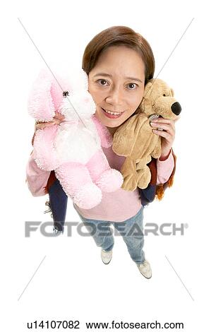 Stock Image - Brown Hair, Close-Up, Casual Clothing, Asian Ethnicity. Fotosearch