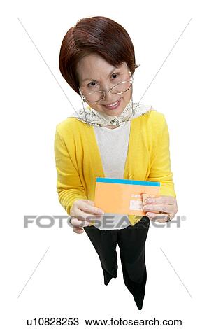 Stock Image - Brown Hair, Close-Up, Cheerful, Casual Clothing, Asian Ethnicity. Fotosearch