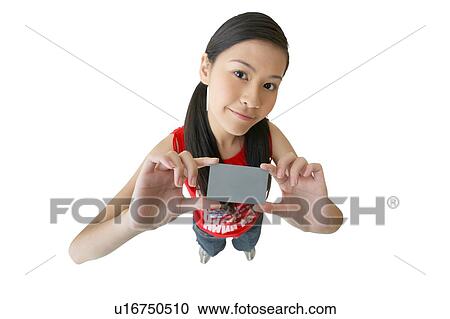Stock Image - Casual Clothing, Asian Ethnicity, Blank, Black Hair, Beautiful, Close-Up, 18-19 Years. Fotosearch