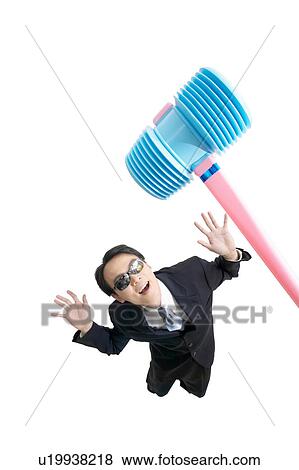 Stock Photo - Close-Up, Asian Ethnicity, Businessman, Business Suit, Black Hair, Arms Raised. Fotosearch