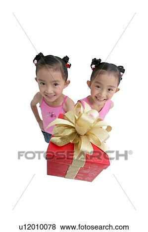 Stock Photo - Girls, Innocence, Smiling, Braids, Waist-Up, Standing, White Background. Fotosearch