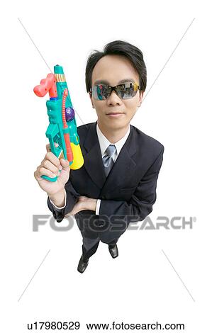 Stock Photo - Toy, Fun, Holding, Cheerful, One Person. Fotosearch
