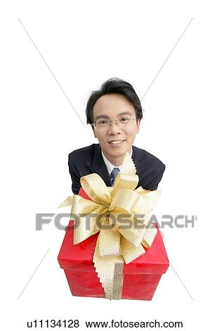 Stock Photo - White Background, Wrapped, Well-Dressed, Asian Ethnicity, Indoor, Standing. Fotosearch