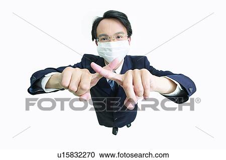Stock Image - Business Suit, Mischief, Businessman, Standing, Human Finger. Fotosearch