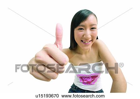 Casual Clothing, Joy, Anticipation, Black Hair, Smiling, Gesturing, One Young Woman Only View Large Photo Image Stock Image - Casual Clothing, Joy, Anticipation, Black Hair, Smiling, Gesturing, One Young Woman Only. Fotosearch