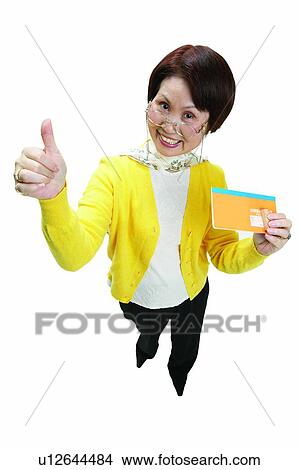 Good Luck Charm, Indoor, Hand Sign, Finance, Satisfaction, Cheerful View Large Photo Image Picture - Good Luck Charm, Indoor, Hand Sign, Finance, Satisfaction, Cheerful. Fotosearch
