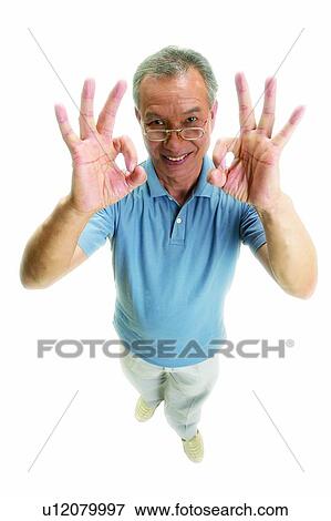 Stock Photo - Gray Hair, Ok Sign, Cheerful, Focus Signals, Communication, Perfection, Casual Clothing. Fotosearch