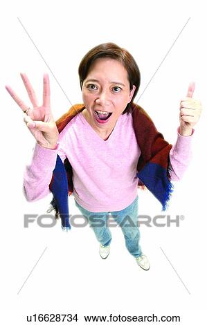 Mouth Open, Human Thumb, Scarf, Thumbs Up View Large Photo Image Picture - Mouth Open, Human Thumb, Scarf, Thumbs Up. Fotosearch