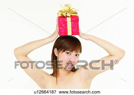 Asian Ethnicity, Close-Up, Brown Hair, Bow, Arms Raised View Large Photo Image Stock Photo - Asian Ethnicity, Close-Up, Brown Hair, Bow, Arms Raised. Fotosearch