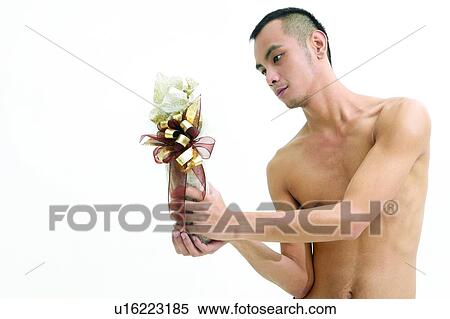 Stock Photography - Bare Chest, Close-Up, Bow, Asian Ethnicity. Fotosearch