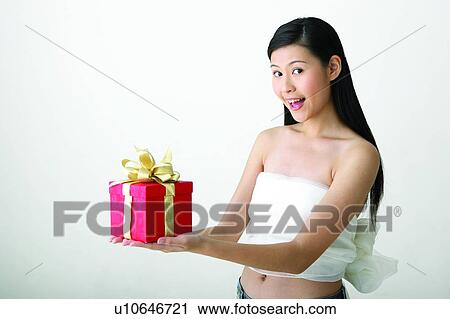 Black Hair, Close-Up, Casual Clothing, Bow, Asian Ethnicity View Large Photo Image Stock Image - Black Hair, Close-Up, Casual Clothing, Bow, Asian Ethnicity. Fotosearch