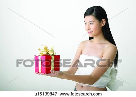 Black Hair, Close-Up, Casual Clothing, Bow, Asian Ethnicity View Large Photo Image Stock Photo - Black Hair, Close-Up, Casual Clothing, Bow, Asian Ethnicity. Fotosearch