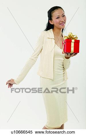 Stock Photography - Black Hair, Close-Up, Casual Clothing, Bow, Asian Ethnicity. Fotosearch
