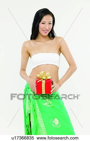Stock Photography - Black Hair, Close-Up, Casual Clothing, Bow, Asian Ethnicity. Fotosearch