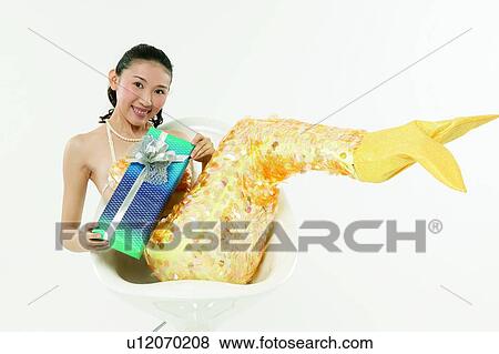 Stock Photo - Bow, Chair, Asian Ethnicity. Fotosearch