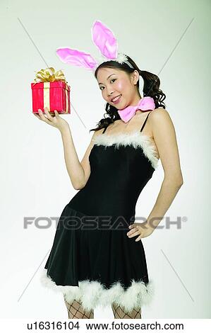 Braids, Pink, Black Hair, Rabbit Costume, Standing, Waist-Up View Large Photo Image Picture - Braids, Pink, Black Hair, Rabbit Costume, Standing, Waist-Up. Fotosearch