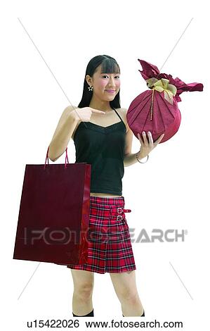 Carrying, Bag, Black Hair, Black, Bangs, Asian Ethnicity View Large Photo Image Stock Photograph - Carrying, Bag, Black Hair, Black, Bangs, Asian Ethnicity. Fotosearch