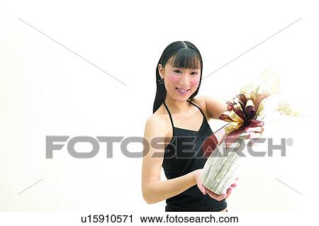 Casual Clothing, Bangs, Bow, Black Hair, Black, Asian Ethnicity View Large Photo Image Stock Image - Casual Clothing, Bangs, Bow, Black Hair, Black, Asian Ethnicity. Fotosearch