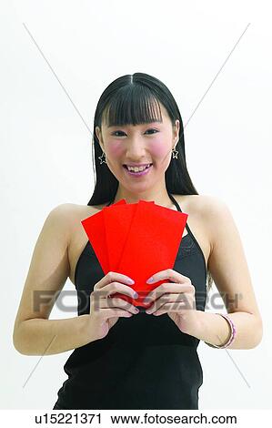 Stock Image - Gift Signals, Rectangle, One Person, Casual Clothing, Bangles, Happiness, Asian Ethnicity. Fotosearch