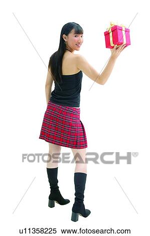 Stock Photography - Holding, Black, One Person, Asian Ethnicity, Smiling, Happiness, Wrapped. Fotosearch