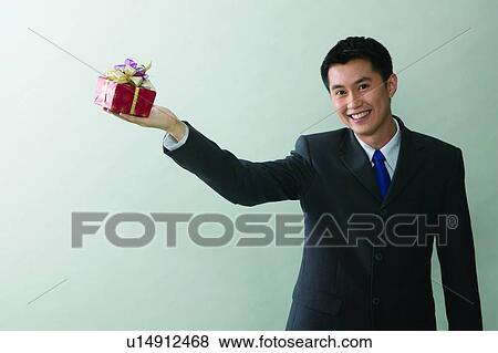 Indoor, Posing, Businessman, Young Adult, Well-Dressed View Large Photo Image Stock Photo - Indoor, Posing, Businessman, Young Adult, Well-Dressed. Fotosearch