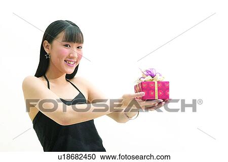Stock Image - One Object, Asian Ethnicity, Casual Clothing, Straight Hair, Smiling. Fotosearch