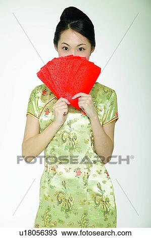 Standing, Looking At Camera, Traditional Clothing, Waist-Up, Asian Ethnicity, Young Adult View Large Photo Image Stock Image - Standing, Looking At Camera, Traditional Clothing, Waist-Up, Asian Ethnicity, Young Adult. Fotosearch