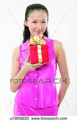 White Background, One Person, Gift, Indoor, Skirt, One Object View Large Photo Image Stock Photography - White Background, One Person, Gift, Indoor, Skirt, One Object. Fotosearch
