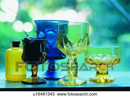 bottle, tableware, blue, glass, yellow View Large Photo Image Stock Image - bottle, tableware, blue, glass, yellow. Fotosearch