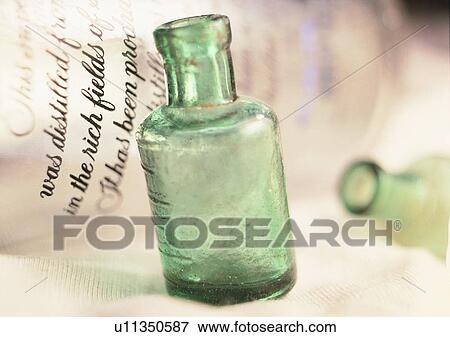 bottle, tableware, glass, green, paper View Large Photo Image Stock Photo - bottle, tableware, glass, green, paper. Fotosearch