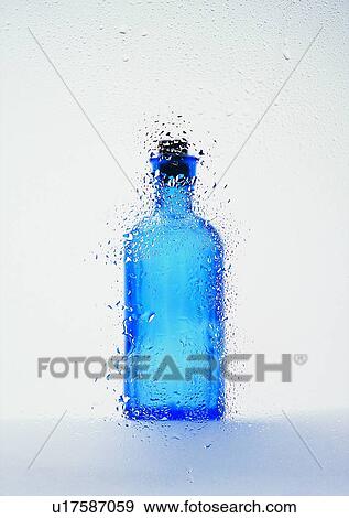 Stock Photo - glass, tableware, bottle, blue, wter drop. Fotosearch