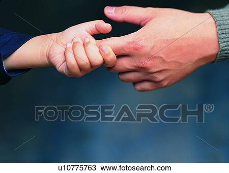 Stock Image - finger, leading, child, hand. Fotosearch
