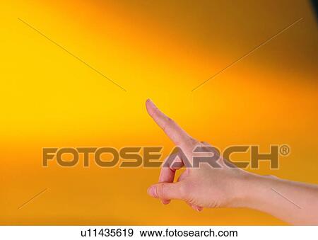 Stock Photo - finger, pointing, indicating, one, direction, index finger. Fotosearch
