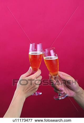 Stock Photo - glass, toast, toasting, hand, drink. Fotosearch