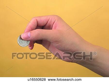 hand, holding, coin, thumb, money, finger View Large Photo Image Stock Photo - hand, holding, coin, thumb, money, finger. Fotosearch