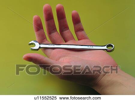 Stock Photography - hand, palm, wrench, finger, tool, thumb. Fotosearch