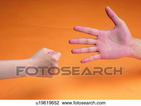 Stock Image - hand, stone, finger, fist, paper, palm. Fotosearch