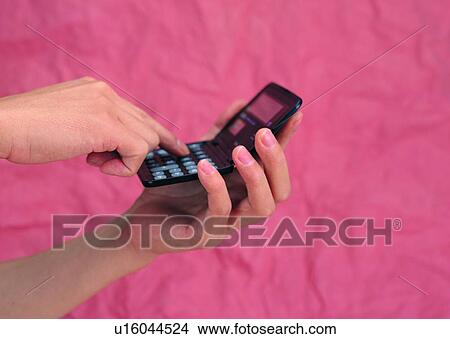 Picture - hands, calculator, keypad, calculating, finger. Fotosearch